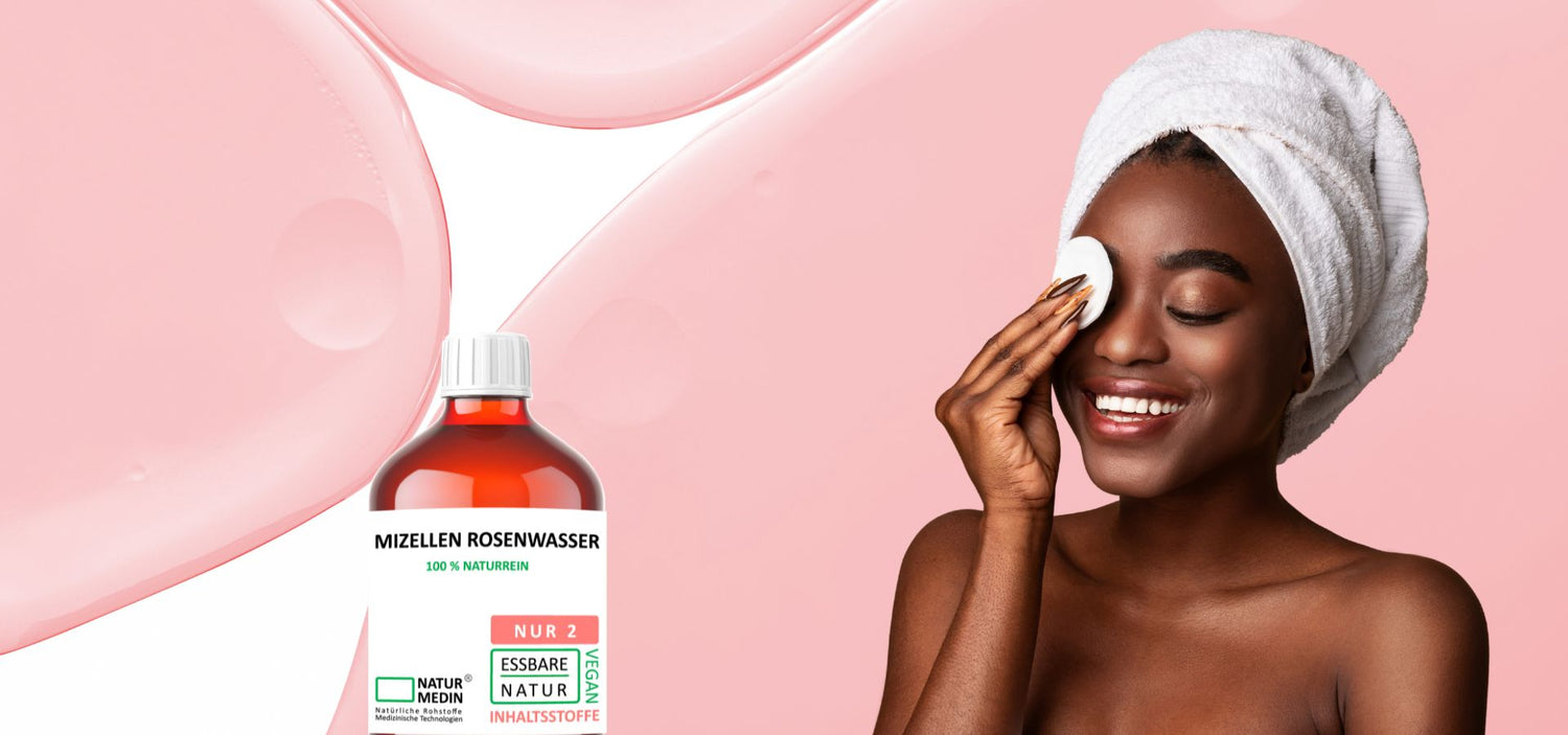 Frau, die ihr Gesicht mit Naturmedin-Mizellenwasser reinigt